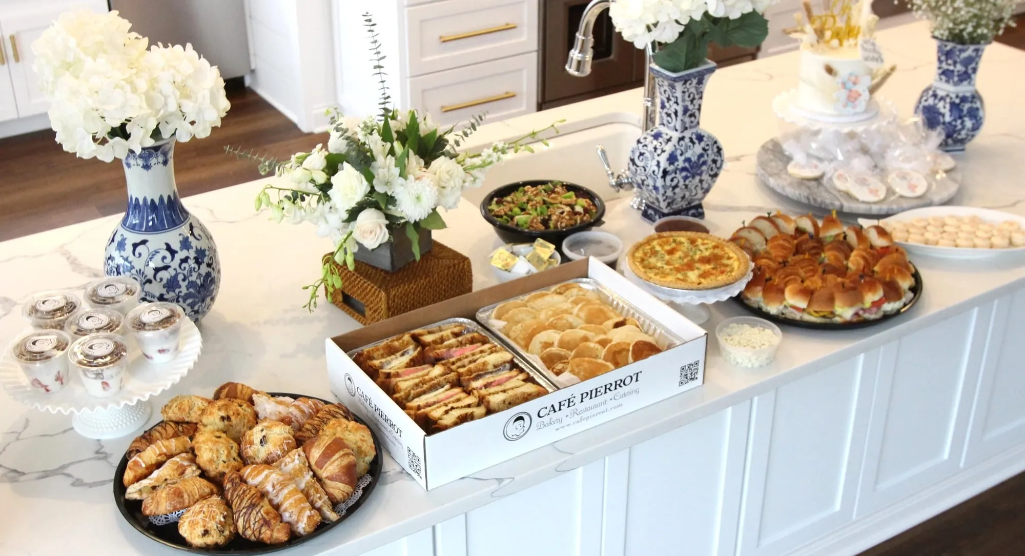A Café Pierrot breakfast and brunch spread of pastries and sandwiches