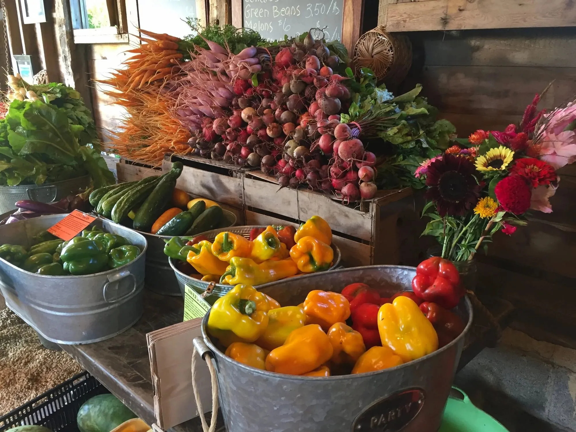 Peppers, beets, carrots and flowers at the Doctor's Farm Market stand