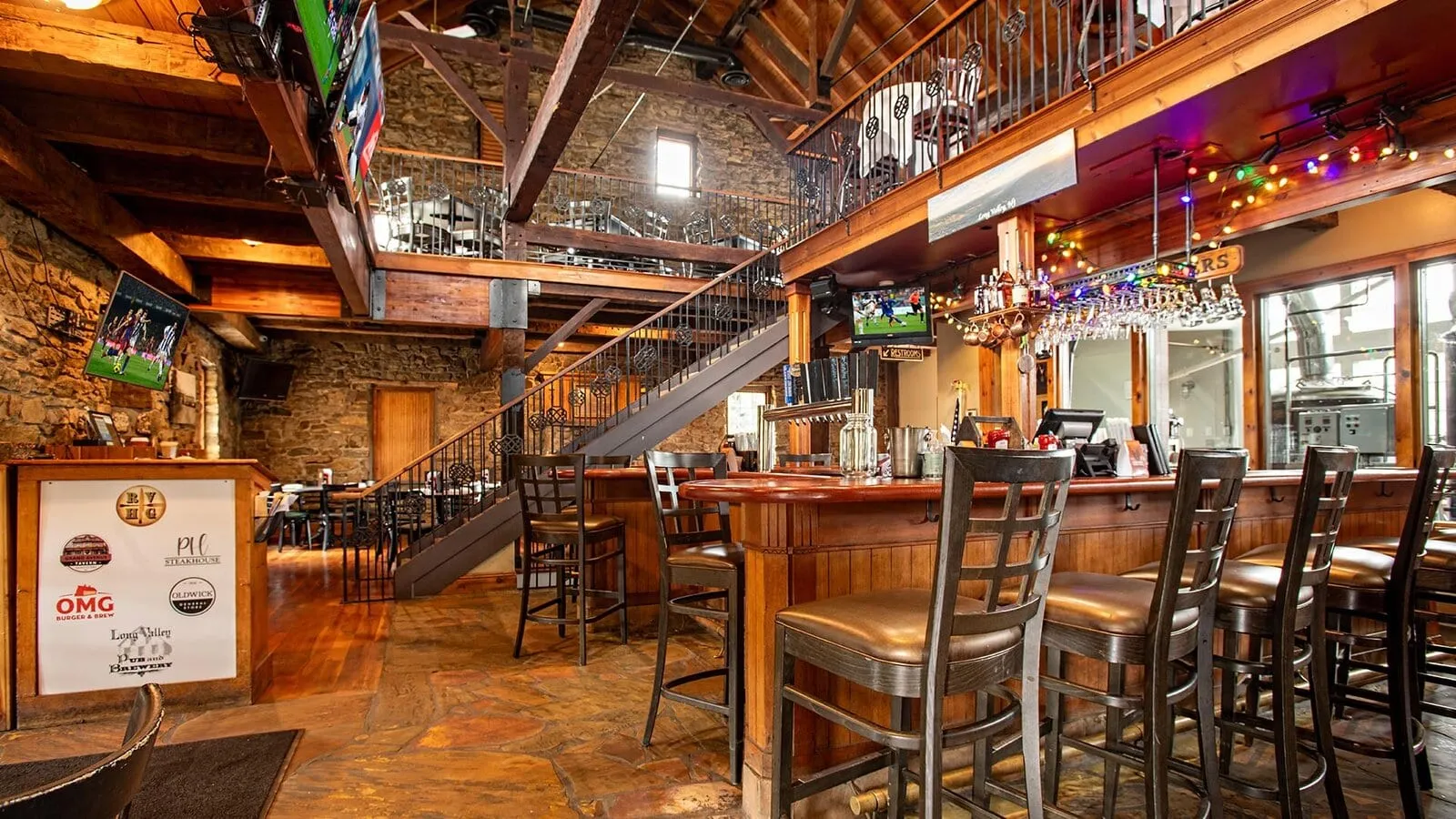 The two-level stone barn dining room at Long Valley Pub & Brewery